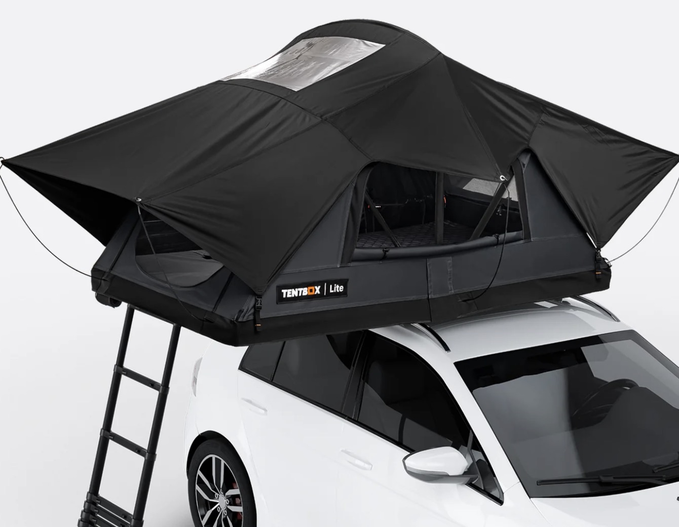 TentBox Lite Refresh roof tent fitted to a white car