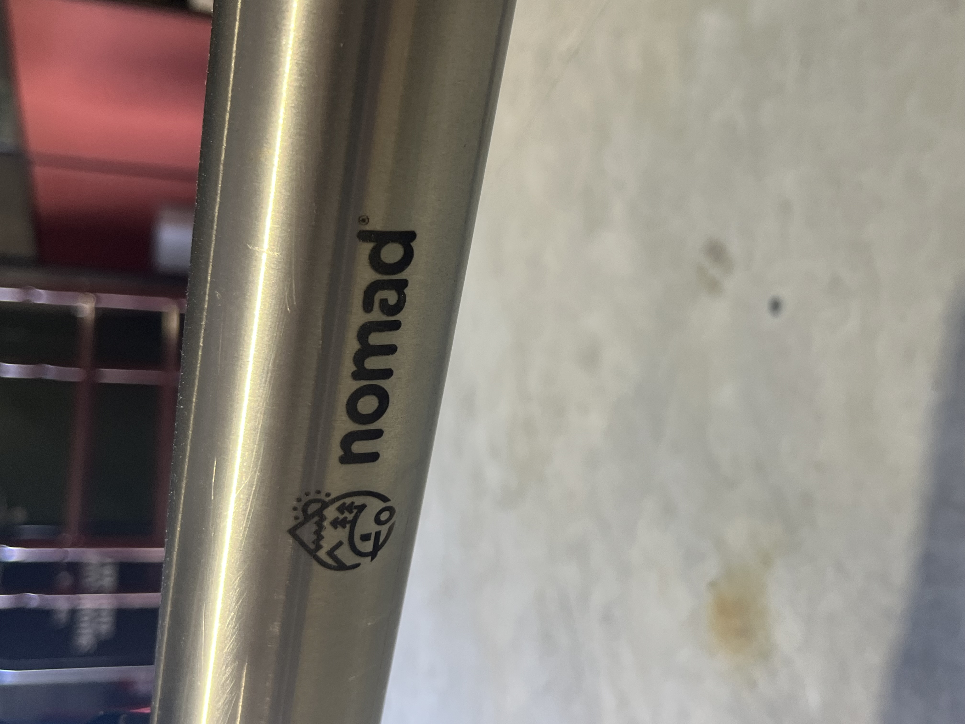 Nomad logo marked on a trailer chassis in the workshop