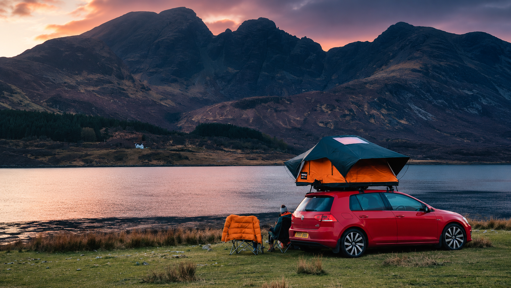 TentBox roof tent setup on a Land Rover at camp